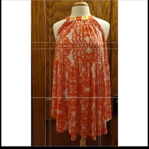 Free People Sleeveless Tunic.Size small. Orange/lavender/yellow.Exposed shoulder